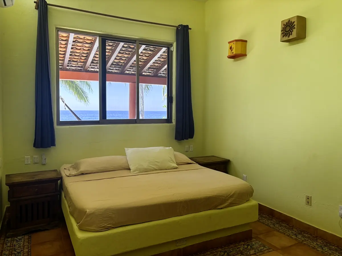 Living area, fold-down bed and kitchen